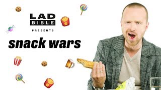 Snack Wars  Aaron Paul Tries A Sausage Roll For The First Time Ever [upl. by Kcirderf]