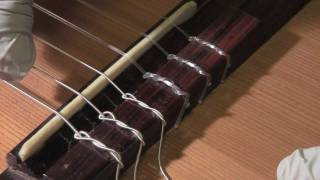 How to restring a classical guitar [upl. by Redyr381]