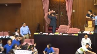 Taiwanese parliament broke out into a water balloon and chairthrowing brawl [upl. by Ela]