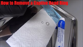 How to Remove the bead from Captive Bead Ring  Body Piercing Jewelry [upl. by Ylekalb]